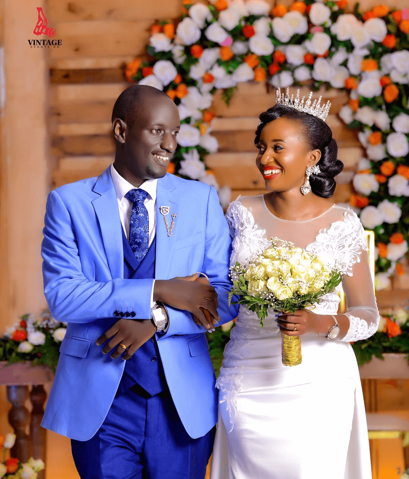 couple and relatives at a wedding ceremony by vintage media and events